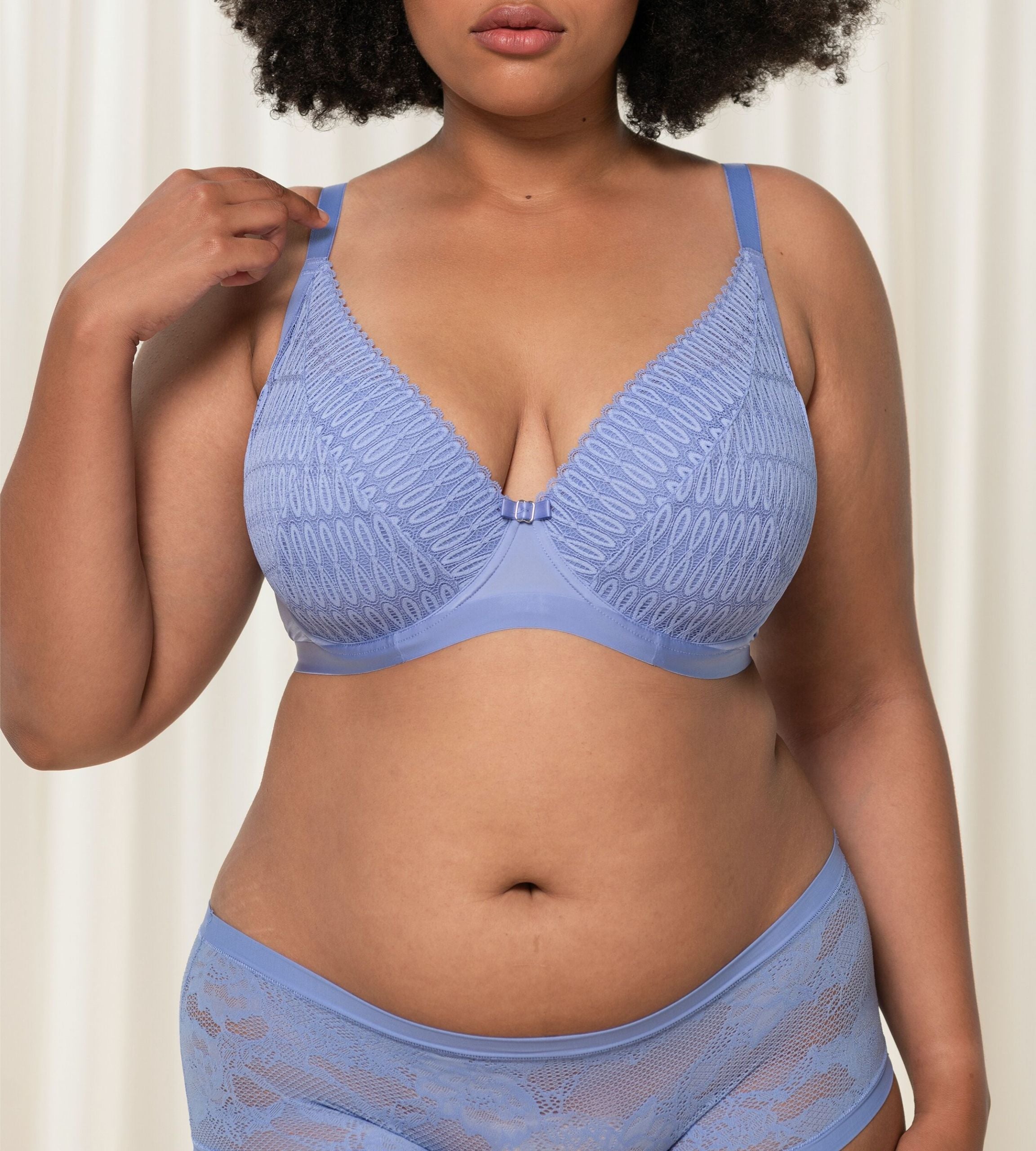 Triumph Aura Spotlight wired padded bra in Purple Dust second model front view, highlighting the lace-overlaid cups and comfortable underwire design. Shop the Latest Online.