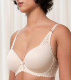 Triumph Aura Spotlight wired padded bra in light beige second model close-up side view, detailing the lace-overlaid cups and comfortable underwired design. Available Online