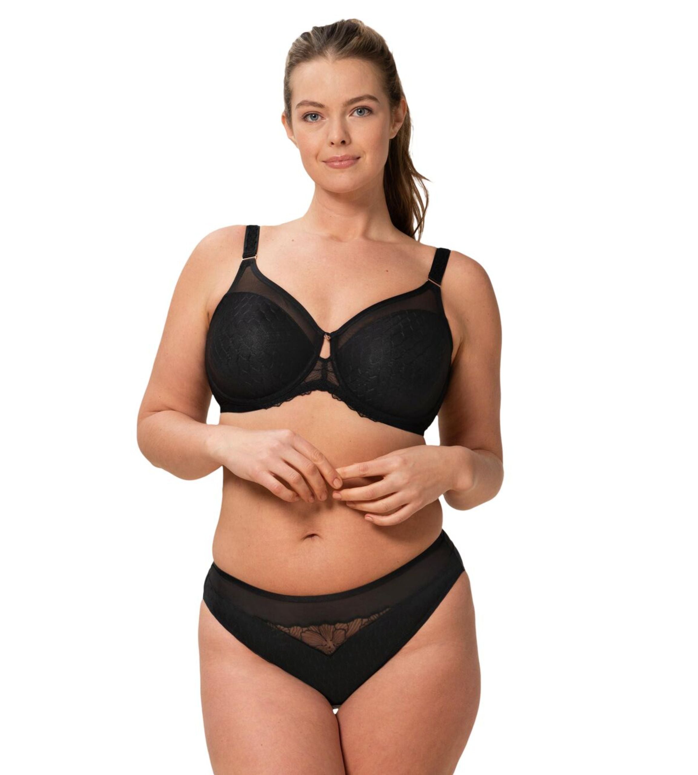 Triumph Azalea Florale Minimizer Bra with textured cups and supportive fit, model front  view showing shaping – Order Online at Blue Salon Qatar
