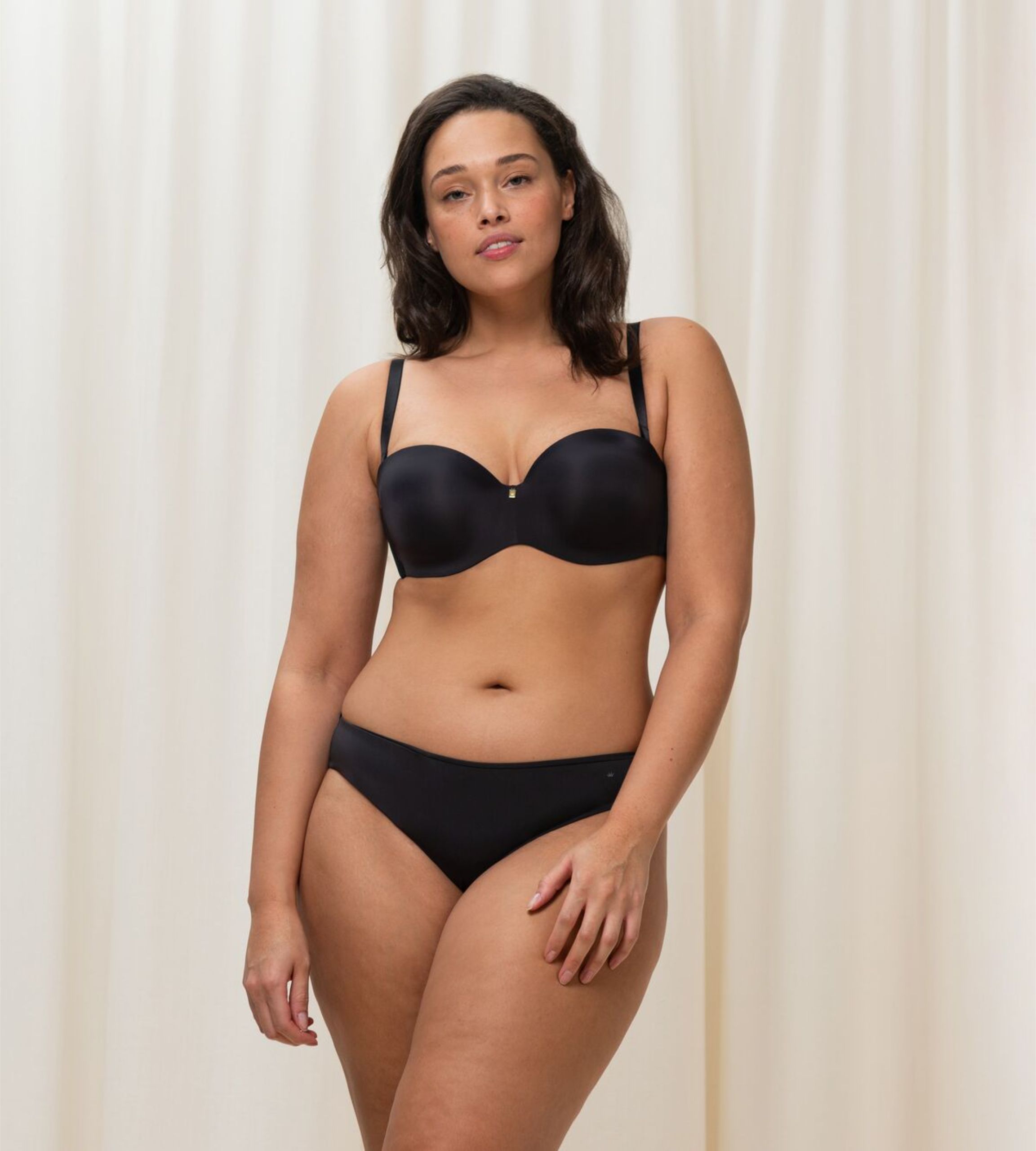 Triumph Body Make-Up Essentials Black multi-strap bra model full front view, highlighting the smooth cups and detachable strap system. Shop the latest Online