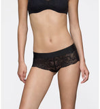 Triumph Body Make-Up Illusion black lace shorts panty model front view, showcasing the floral lace and seamless waistband. Available Online at Blue Salon Qatar