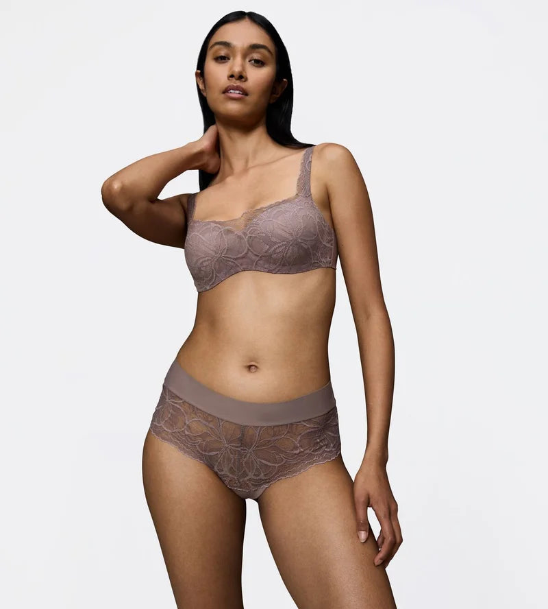 Triumph Body Make-Up Illusion grey lace shorts panty model full front view, highlighting the floral lace detail and seamless finish. Order Online at Blue Salon Qatar