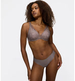 Triumph Body Make-Up Illusion lace grey wired padded bra model full front view, showcasing the smooth  floral lace cups and plunge neckline. Find Online Today