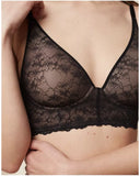 Triumph Bright Spotlight black padded bra model close-up view, showcasing the detailed floral lace and elegant plunge neckline. Shop Now Online