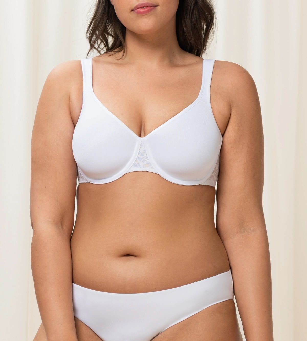 Triumph Comfort Minimizer White Bra front view worn by model, showcasing smooth molded cups and supportive fit - Shop Online Now at Blue Salon Qatar