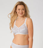 Triumph Delicate Doreen white non-wired bra model front view, highlighting the intricate lace cups and supportive wide straps. Available Now Online