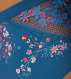 Triumph Electra Spotlight blue high waist thong model close-up view, highlighting the floral mesh deign. Available Online Today