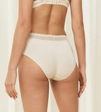 Triumph Feel Of Modal light beige midi panties model back view, showing the silky fabric and a decorative lace waistband. Available Online