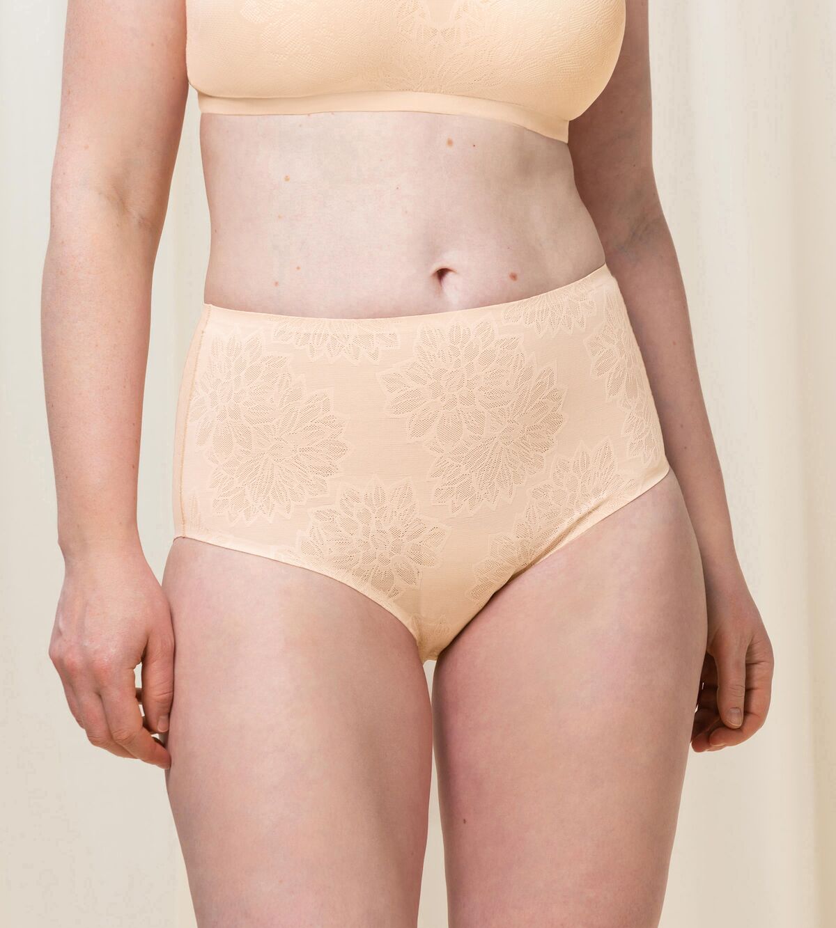 Triumph Fit Smart light beige maxi panty model front view, highlighting the floral 4D stretch lace and high-waisted silhouette. Available for Online Purchase