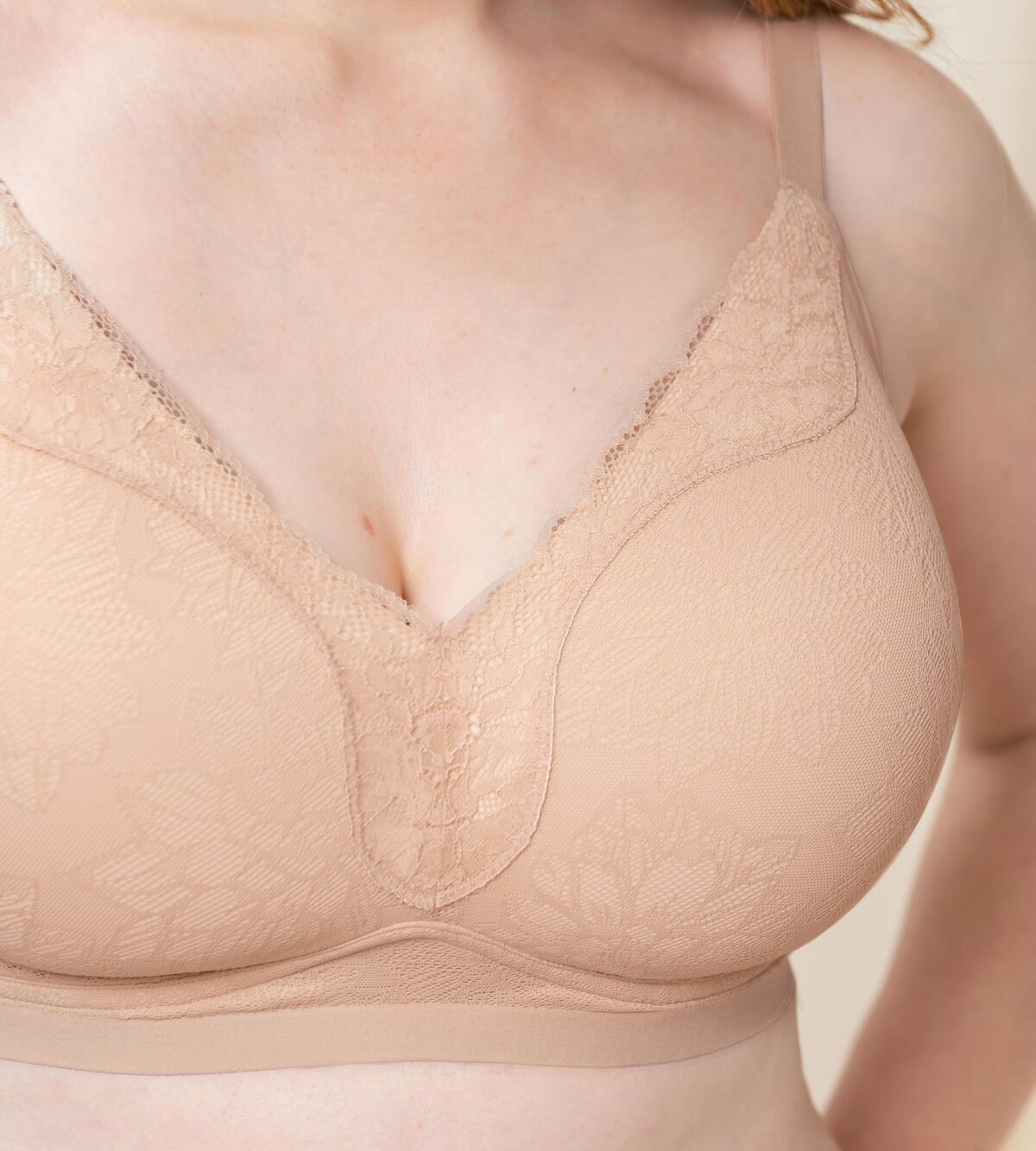 Triumph Fit Smart light beige padded bra second model close-up view, showing the decorative 4D lace and wireless cup construction. Shop the Latest Online
