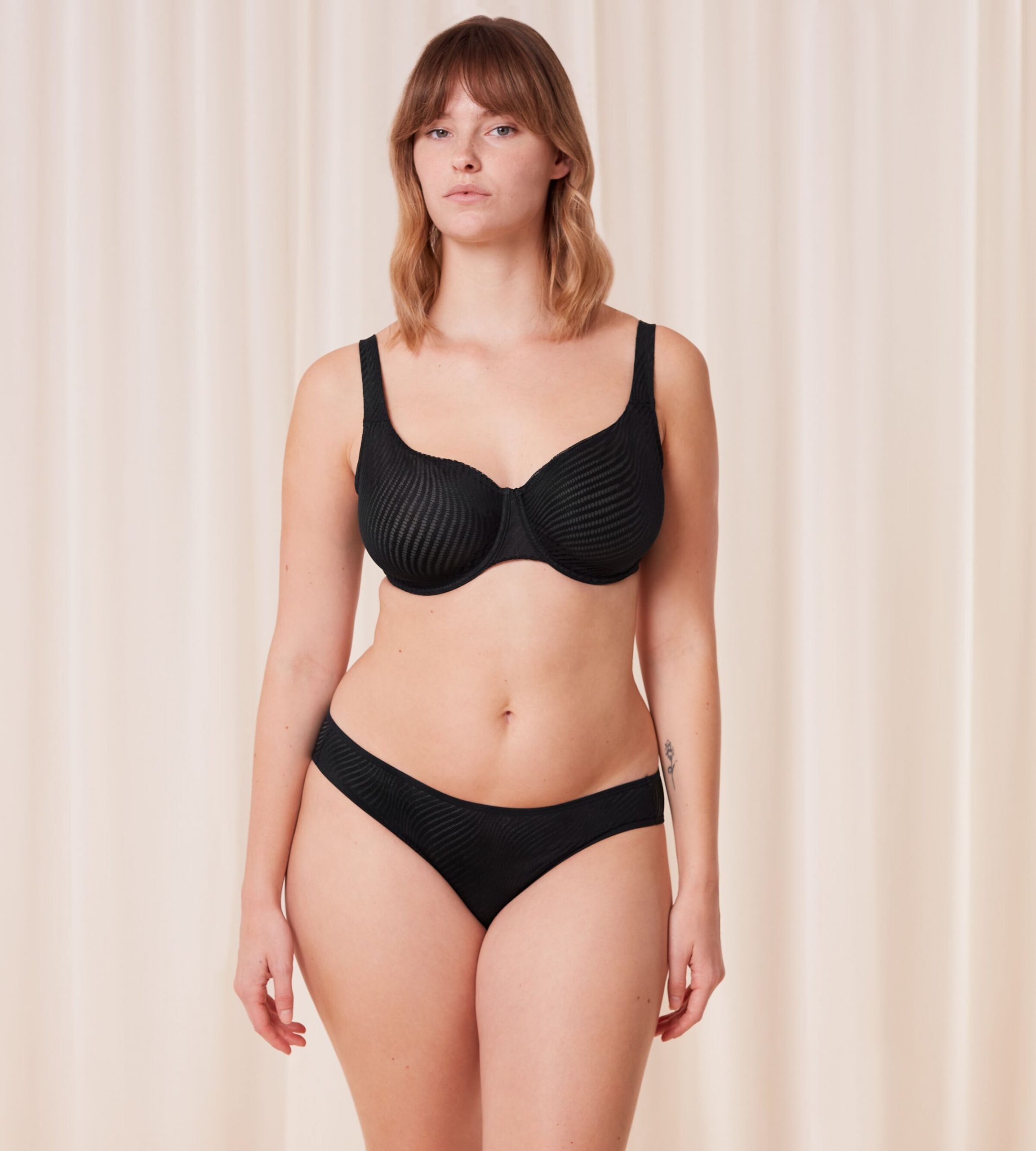 Triumph Harmony Spotlight Minimizer Black Bra, full-body model view for fit reference – Shop Now Online