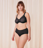 Triumph Signature sheer black minimizer bra second model full front view, with geometric monogram pattern. Now Available for Online Purchase