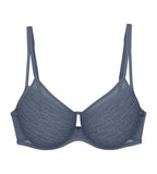 Triumph Signature sheer cloudy blue minimizer bra product-only view, with geometric pattern. Shop Online Today
