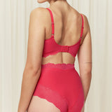 Triumph Summer Sensation deep pink minimizer bra model back view, showing mesh details and adjustable straps. Available at Blue Salon Qatar.