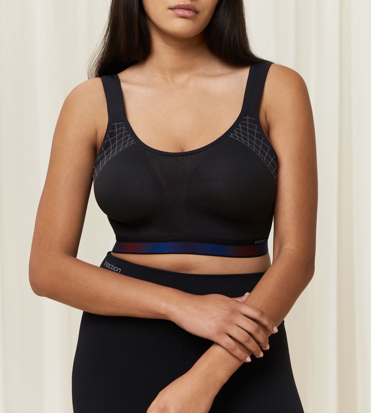 Triumph Triaction Cardio Cloud Black Sports Bra model second front view, now available online