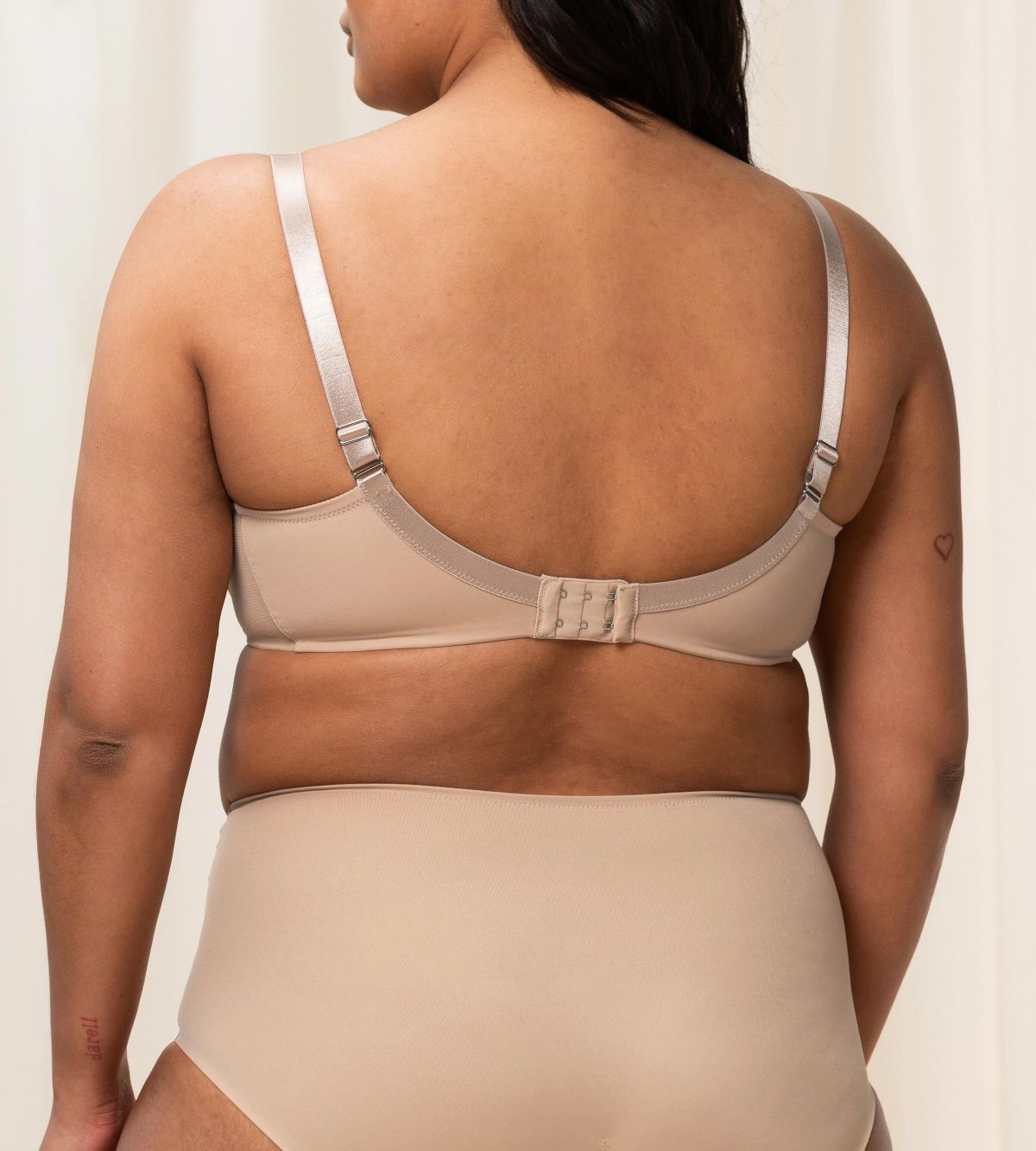 Triumph True Shape Sensation Beige Minimizer Bra model back view showing adjustable straps – smooth shaping support, Shop the Latest Online