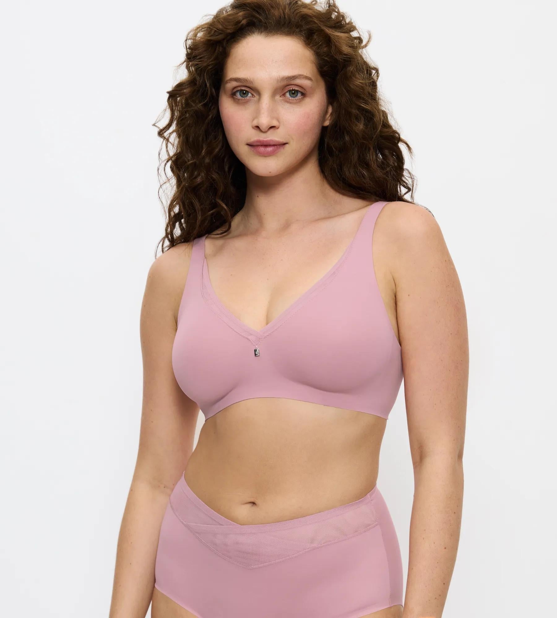 Triumph True Shape Sensation non-wired minimizer bra in Rosebloom model front view with seamless cups and smooth shaping, Available at Blue Salon Qatar