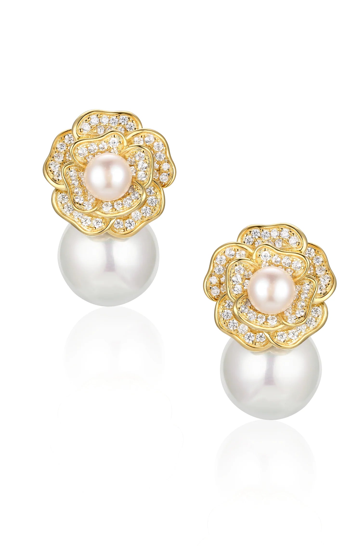Pair of gold-plated floral earrings with clear stones, a small pinkish pearl in the centre, and a large white pearl drop.