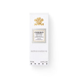 White rectangular after-shave lotion box with a gold-toned crest, a framed label reading 'CREED' and 'AFTER-SHAVE', and '75 M