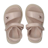 Pair of light pink velcro sandals with gold-toned CK logos on the front straps and light cream soles.