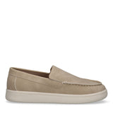 Beige low-cut slip-on sneaker with a suede-like upper, moccasin-style toe stitching, embossed 'CK' logo on the vamp, and a th