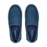Blue low-cut slip-on sneakers with white soles, stitched toe boxes, and a small 'ck' logo.