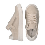 Beige low-cut sneakers with white soles, lace-up fronts, and side zippers. Features a white side stripe and suede-like upper.