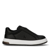Black low-cut slip-on sneaker with a thick white platform sole, mesh collar, and a black "CK" logo on the side.