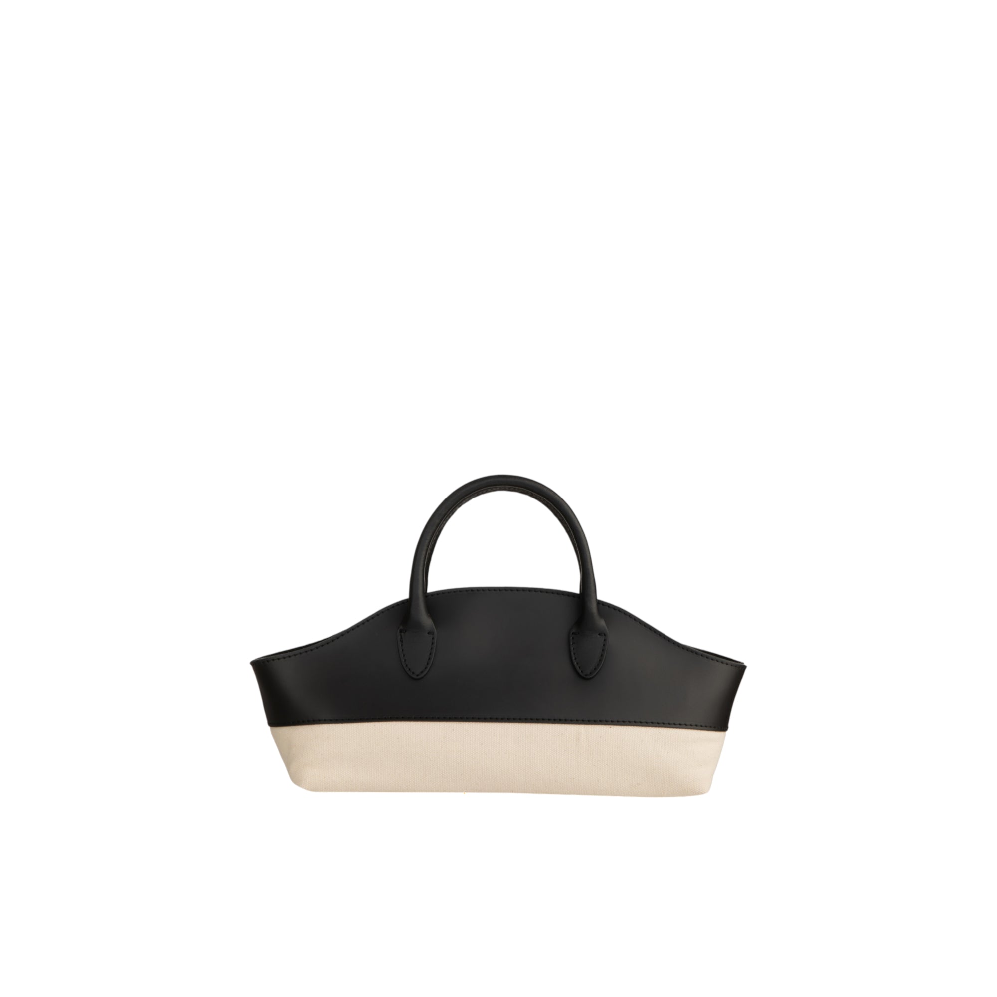 Black leather and natural canvas two-tone tote bag with two short top handles and a curved upper edge.