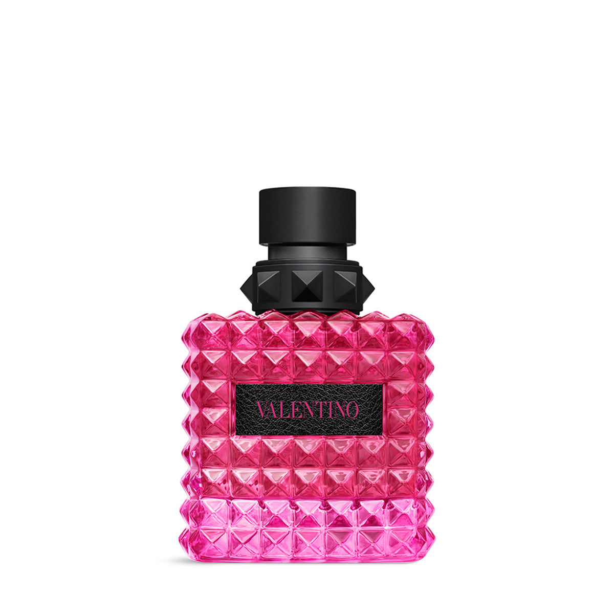 A vibrant pink Valentino Donna Born In Roma Pink PP fragrance bottle featuring the signature all-over rockstud textured glass, a black cap with a studded collar, and a black leather-style label with the Valentino logo in pink.