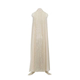Velvety Couture ivory floor-length gown featuring an embellished geometric panel and flowing chiffon draped overlay.