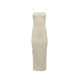 Velvety Couture ivory floor-length gown featuring an embellished geometric panel and flowing chiffon draped overlay.