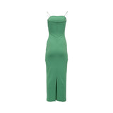 Velvety Couture green floor-length gown with long draped sleeves and scattered gold sequin embellishments.