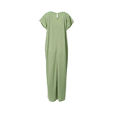 Back view of the sage green inner dress showing the keyhole button closure at the neckline.