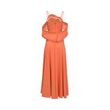 Velvety Couture coral gown with draped ruffled neckline, beaded trim, and flowing A-line silhouette. Find Online Today.
