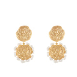 Pair of gold-toned drop earrings with textured, irregular discs and a border of small white cultured pearls.