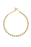 Gold-toned necklace with textured orbs, each set with a round turquoise stone. Features a hook clasp and extender chain.