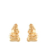 Pair of gold-toned statement hoop earrings with a sculptural, wavy, and rippled texture.