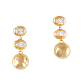 Pair of gold-toned dangling earrings, each with two oval clear stones in irregular bezels and a larger irregular gold-toned o