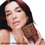 Square brown bronzer compact with a quilted lid and a gold-toned YSL logo.