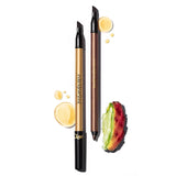 Two YSL makeup pencils: one gold-toned, one bronze-toned. Both have black ends with slanted and pointed dark tips.