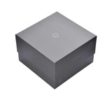 Gray gift box with a brand logo on a white background.