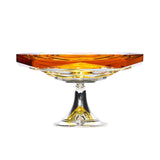 A two-tiered silver display stand with mirrored surfaces and crystal-encrusted circular rails on a white background.