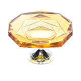 Close-up of the silver-plated ring handle and the shimmering crystal-inlaid border of the top mirrored tier.