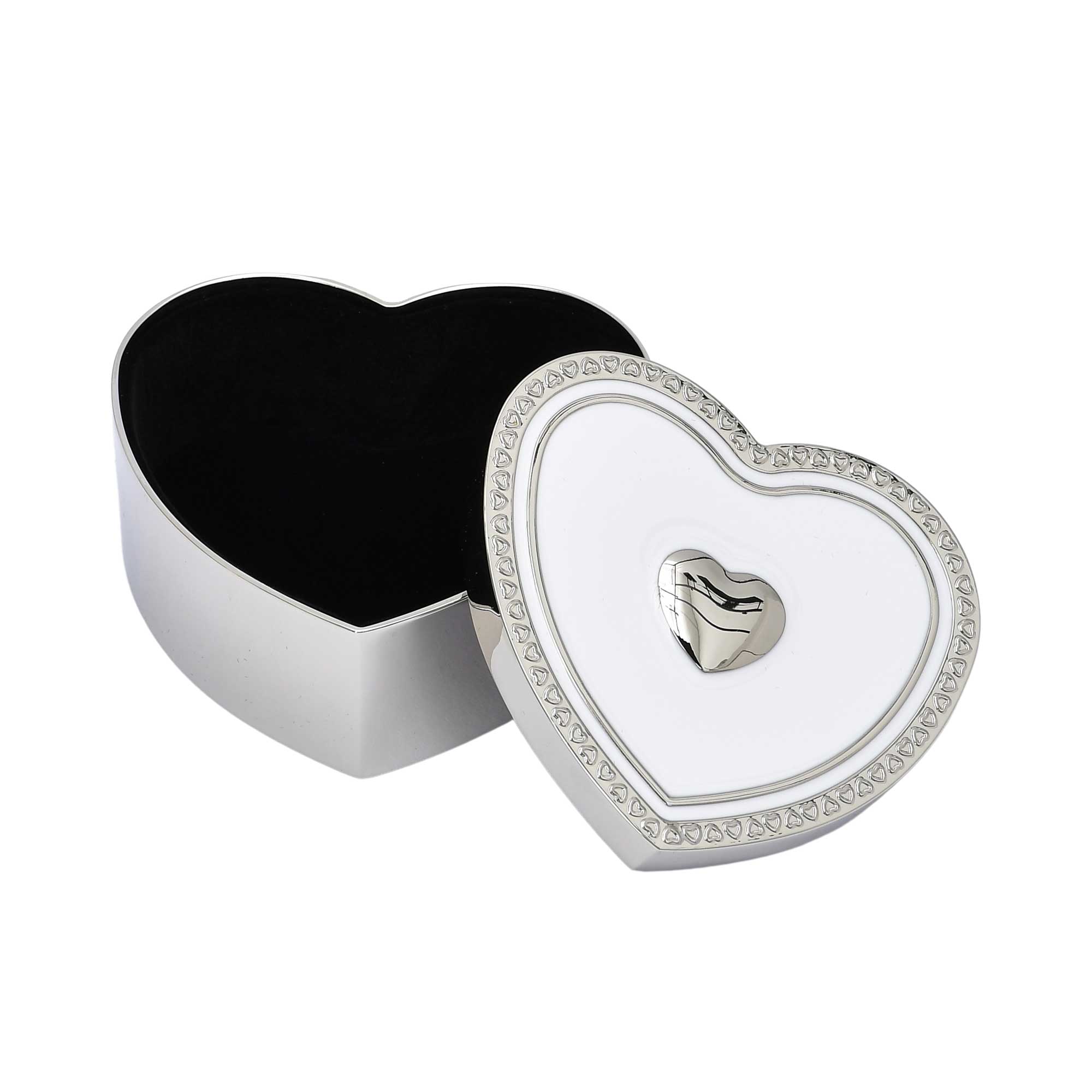 An open silver heart jewelry box revealing a plush black velvet interior, with the decorated white and silver lid resting beside it.