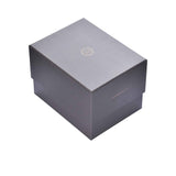 Gray gift box with a brand logo on a white background.