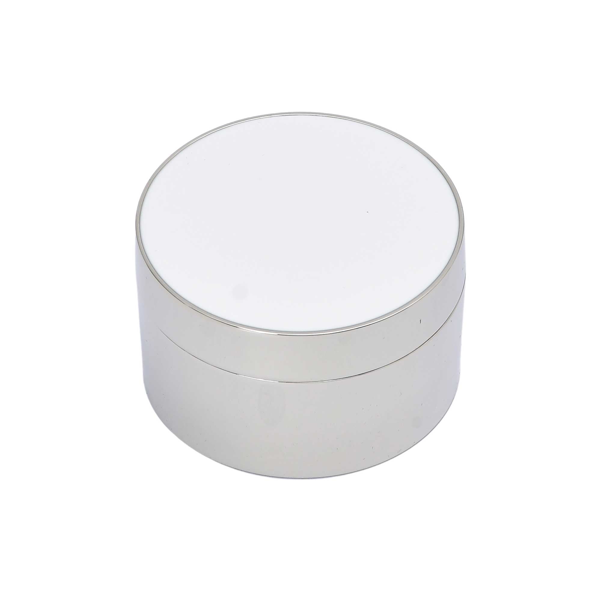 A sleek, round silver-toned trinket box with a smooth white enamel lid shown against a white background.