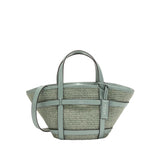 Women's Key West Tote Crossbody Bag Light blue woven handbag with leather straps on a white background