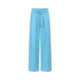 Front view of women's sky blue wide-leg trousers featuring a drawstring waistband with metal tips and front pleats, available at BLUE SALON shop.