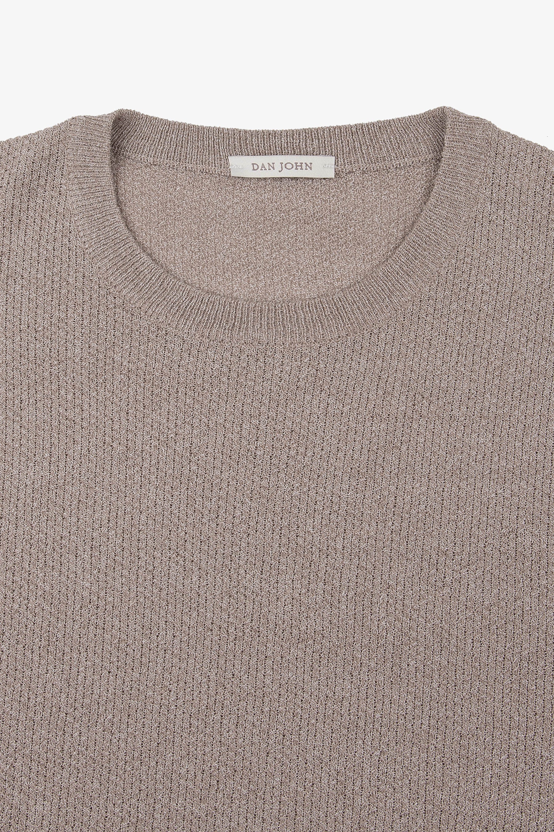 Taupe ribbed knit sweater with a crew neck collar.